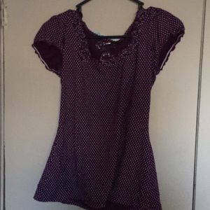 A purple Polkadotted T-shirt
